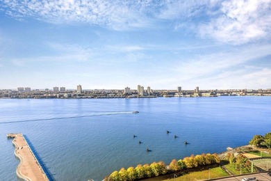 High above Riverside Boulevard on the 24th floor, this expansive - photo 2