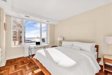 High above Riverside Boulevard on the 24th floor, this expansive - photo 9