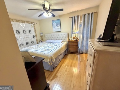 Charming, solid all-brick 2BR/1BA home tucked away on one of