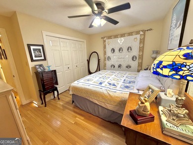 Charming, solid all-brick 2BR/1BA home tucked away on one of