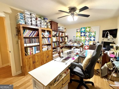 Charming, solid all-brick 2BR/1BA home tucked away on one of