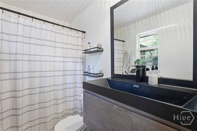 Tucked beneath mature trees on Wilmington Island, 607 Leaning - photo 15