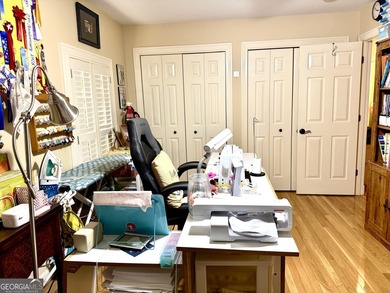 Charming, solid all-brick 2BR/1BA home tucked away on one of