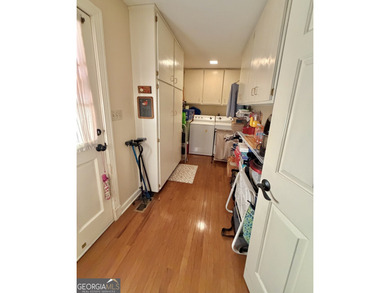 Charming, solid all-brick 2BR/1BA home tucked away on one of