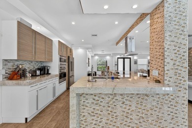 Stunning modern home in prestigious Coral Ridge Country Club! - photo 18