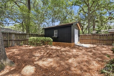 Tucked beneath mature trees on Wilmington Island, 607 Leaning - photo 23