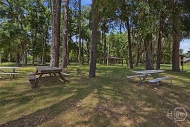 Tucked beneath mature trees on Wilmington Island, 607 Leaning - photo 25