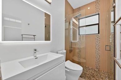 Stunning modern home in prestigious Coral Ridge Country Club! - photo 33
