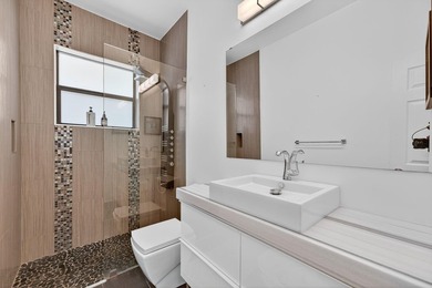 Stunning modern home in prestigious Coral Ridge Country Club! - photo 36