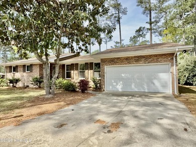 Don't miss out on this MOVE-IN ready, freshly painted, brick - photo 3