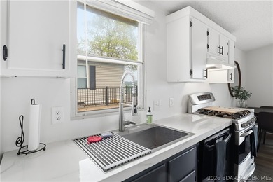 Wake up to beautiful lake sunrises at this turnkey retreat on - photo 12