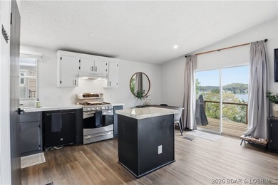 Wake up to beautiful lake sunrises at this turnkey retreat on - photo 13