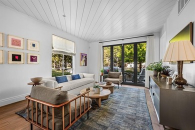 This iconic Lakewood residence masterfully blends historic charm