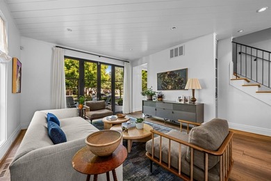 This iconic Lakewood residence masterfully blends historic charm