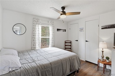 Wake up to beautiful lake sunrises at this turnkey retreat on - photo 16