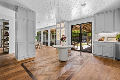 This iconic Lakewood residence masterfully blends historic charm