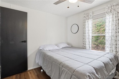 Wake up to beautiful lake sunrises at this turnkey retreat on - photo 17