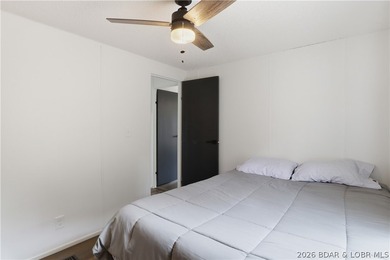 Wake up to beautiful lake sunrises at this turnkey retreat on - photo 18