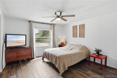 Wake up to beautiful lake sunrises at this turnkey retreat on - photo 19