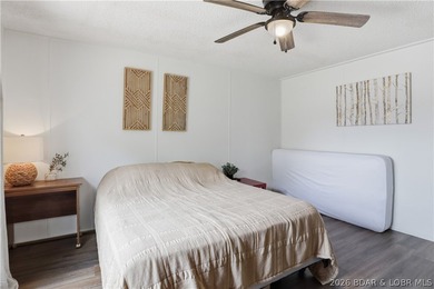 Wake up to beautiful lake sunrises at this turnkey retreat on - photo 20