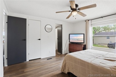 Wake up to beautiful lake sunrises at this turnkey retreat on - photo 22