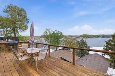 Wake up to beautiful lake sunrises at this turnkey retreat on - photo 30