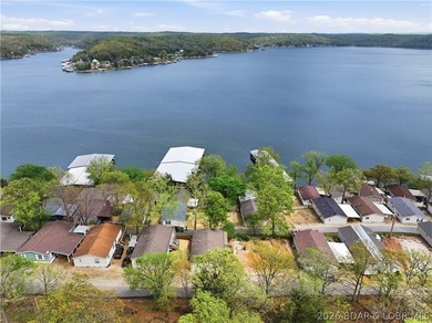 Wake up to beautiful lake sunrises at this turnkey retreat on - photo 32