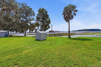 Wake up to breathtaking sunrise views over the lake in this - photo 38