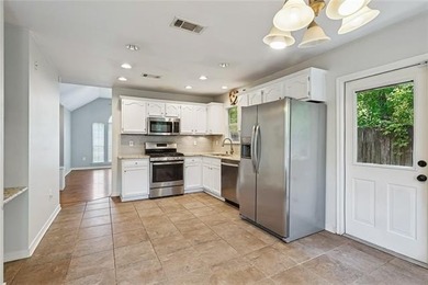 This charming 3-bedroom, 2-bath home combines stylish finishes - photo 8