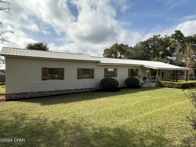 Lake Home For Sale in Sneads, Florida