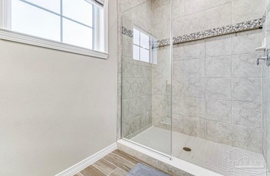 This beautifully furnished coastal residence is located in the - photo 13