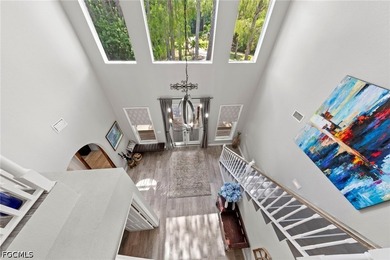 Tucked behind a private gated entrance on a lush 2.5 acre wooded - photo 12