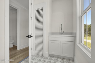 Welcome to 123 Night Heron Trace in Summerhouse on Everett Bay!