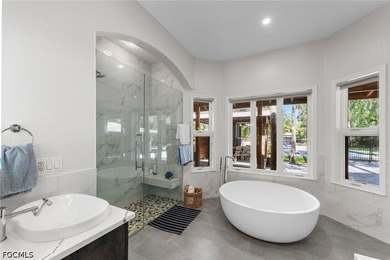Tucked behind a private gated entrance on a lush 2.5 acre wooded - photo 23
