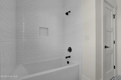 Welcome to 123 Night Heron Trace in Summerhouse on Everett Bay!