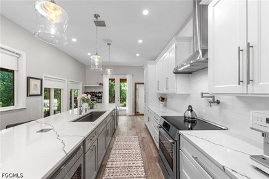 Tucked behind a private gated entrance on a lush 2.5 acre wooded - photo 35