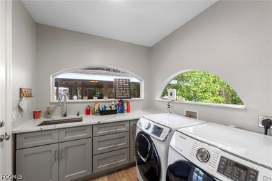 Tucked behind a private gated entrance on a lush 2.5 acre wooded - photo 37