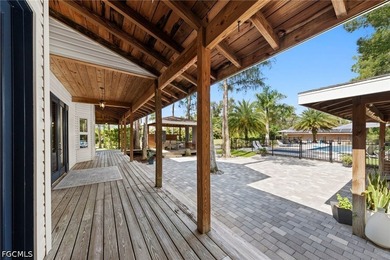 Tucked behind a private gated entrance on a lush 2.5 acre wooded - photo 39