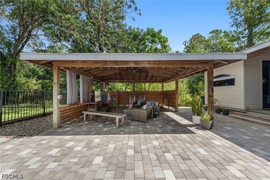 Tucked behind a private gated entrance on a lush 2.5 acre wooded - photo 43
