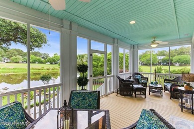 Positioned along the shores of a spring-fed lake in the coveted - photo 21