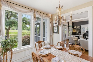 Positioned along the shores of a spring-fed lake in the coveted - photo 22