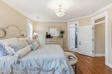 Positioned along the shores of a spring-fed lake in the coveted - photo 25