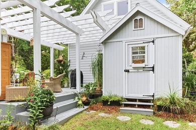 Positioned along the shores of a spring-fed lake in the coveted - photo 41