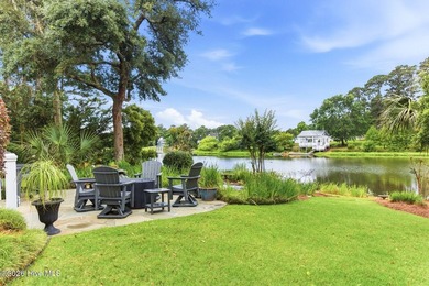 Positioned along the shores of a spring-fed lake in the coveted - photo 43