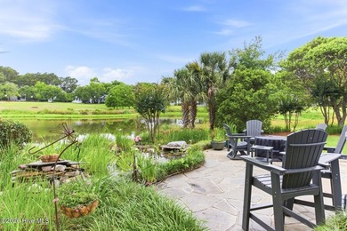 Positioned along the shores of a spring-fed lake in the coveted - photo 44