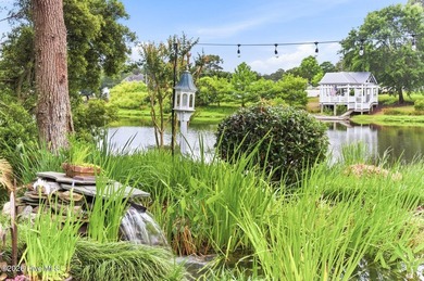Positioned along the shores of a spring-fed lake in the coveted - photo 45