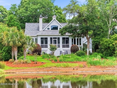 Positioned along the shores of a spring-fed lake in the coveted - photo 49