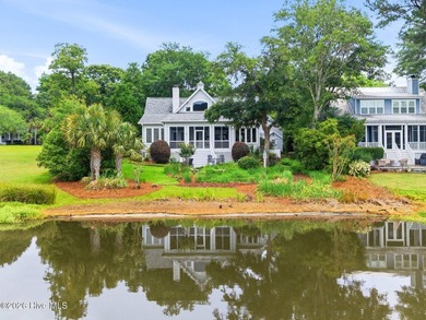 Positioned along the shores of a spring-fed lake in the coveted - photo 50