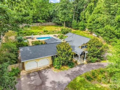 Experience luxury mountain living on the 9th fairway of the - photo 7