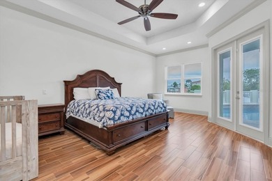 Welcome to 811 Birdie Way, a stunning custom-built waterfront - photo 11